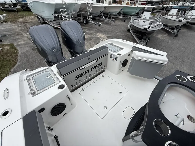 Slide: The Image of 2026 Sea Pro 292 with Yamaha 300S engines on a boat lot. - 15