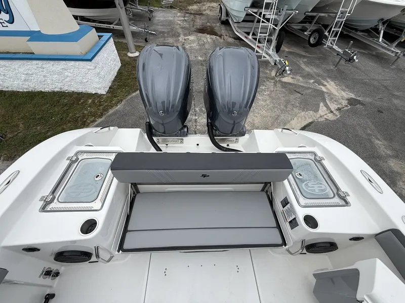 Slide: The Image of 2026 Sea Pro 292 with Yamaha 300S engines, rear view. - 19