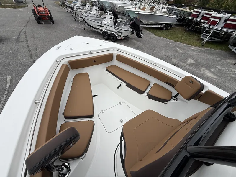 Slide: The Image of Interior view of Sea Pro 222 boat with brown seats, model year 2026. - 14