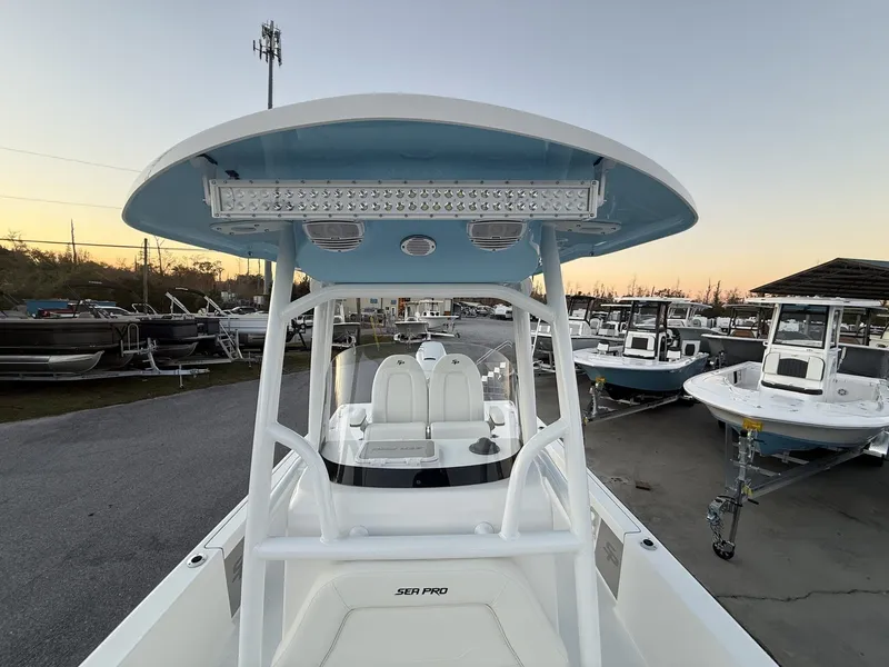 Slide: The Image of 2026 Sea Pro 250 Bay boat parked at sunset. - 4