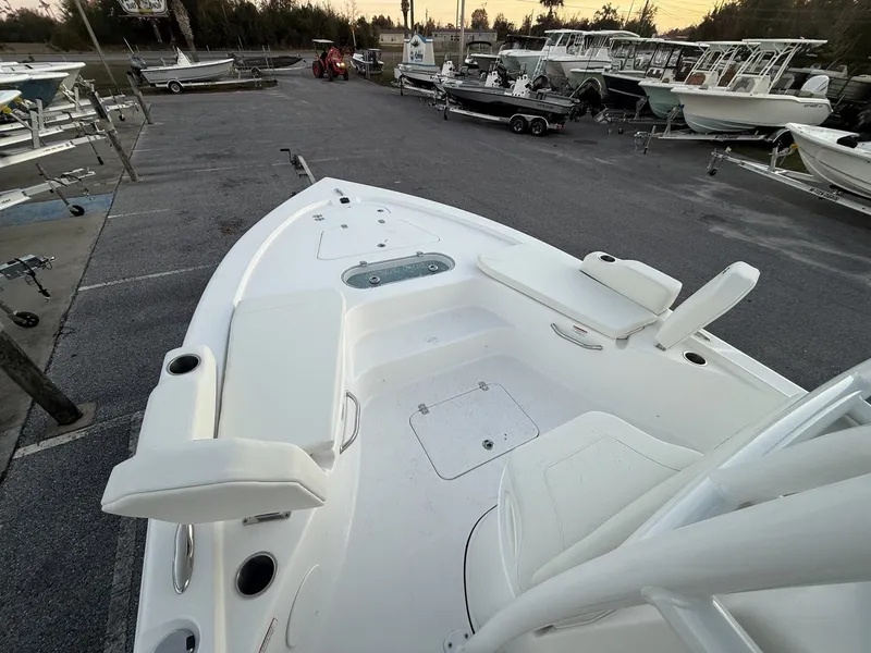Slide: The Image of 2026 Sea Pro 250 Bay boat on a parking lot. - 8