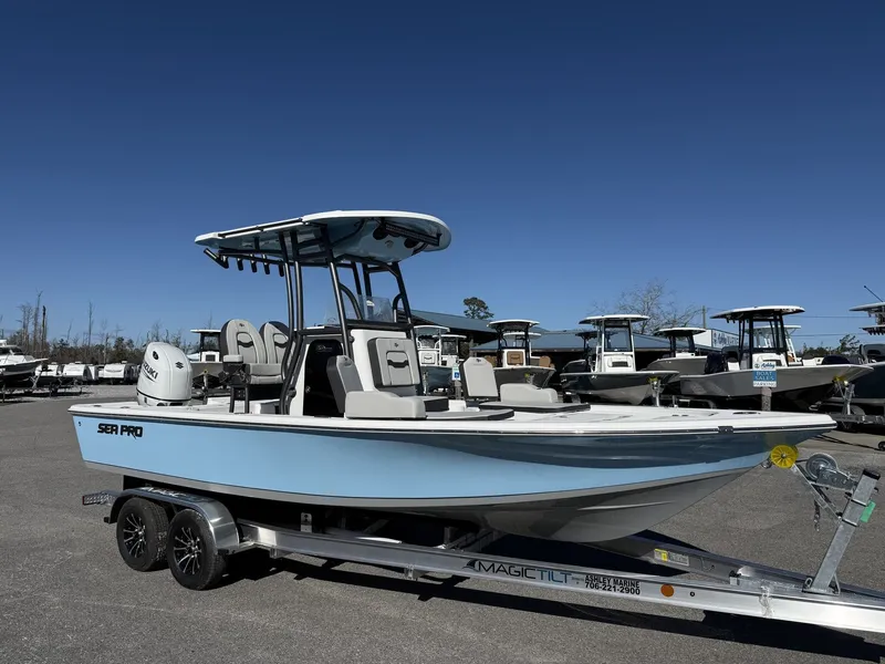 The Image of 2026 Sea Pro 230 Bay boat on trailer outdoors. - 1