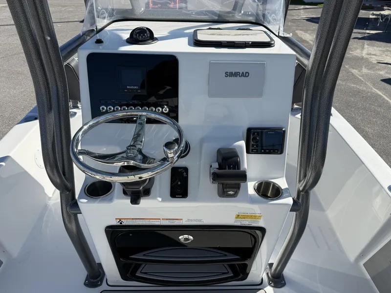 Slide: The Image of Helm console of Sea Pro 230 Bay boat, model year 2026. - 11
