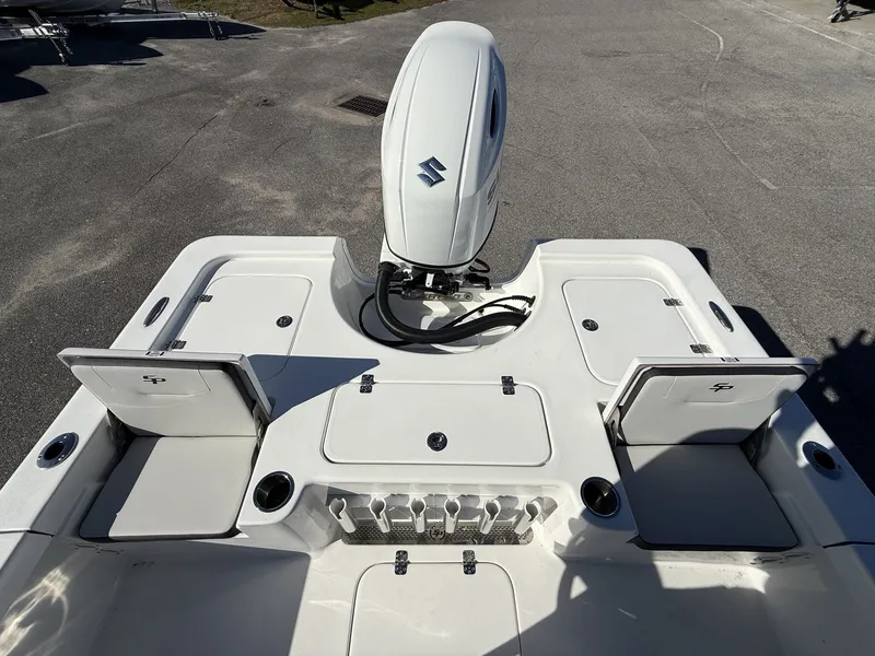 Slide: The Image of Rear view of a 2026 Sea Pro 230 Bay boat with engine. - 12