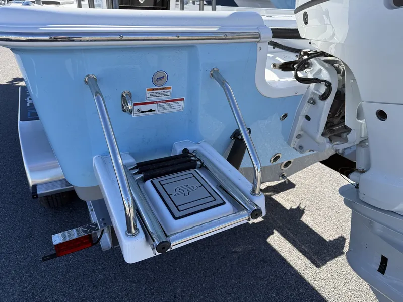 Slide: The Image of Rear view of 2026 Sea Pro 230 Bay with swim ladder. - 4