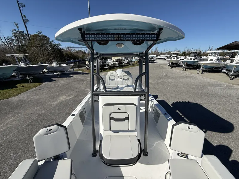 Slide: The Image of 2026 Sea Pro 230 Bay boat on a parking lot. - 9