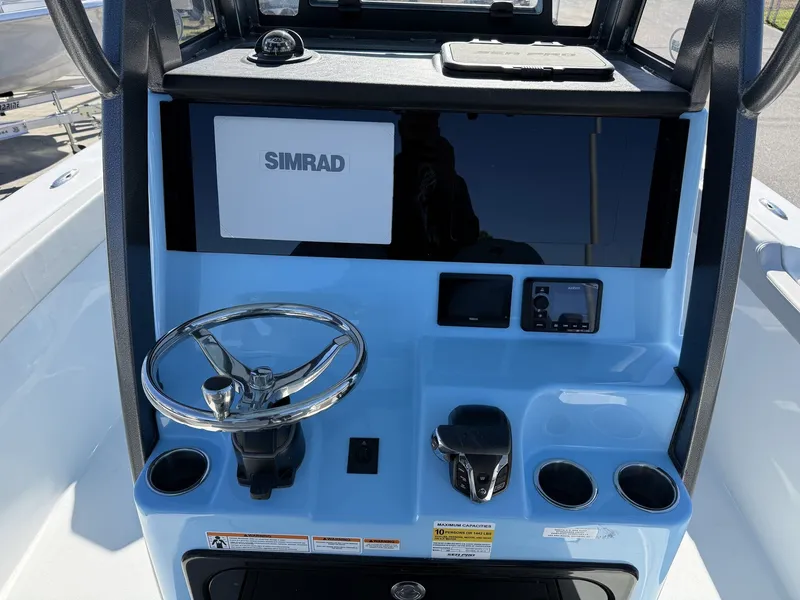 Slide: The Image of 2026 Sea Pro 245FLX R boat console with Simrad display. - 13