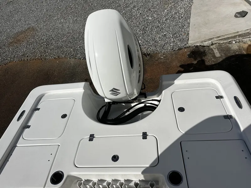 Slide: The Image of Rear view of a 2026 Sea Pro 230 Bay boat with outboard motor. - 8