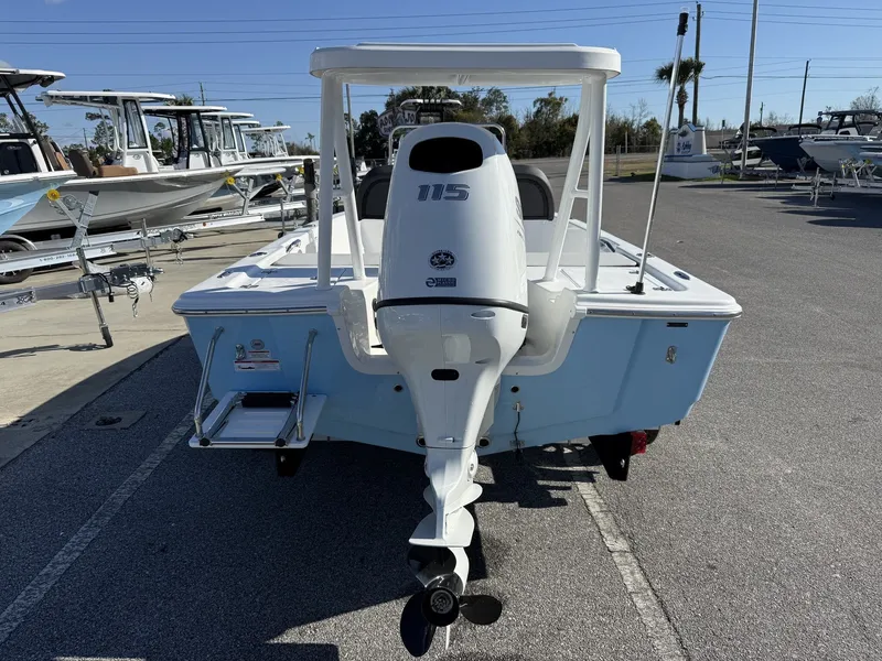 Slide: The Image of Rear view of a 2026 Sea Pro 172 Bay boat outdoors. - 12