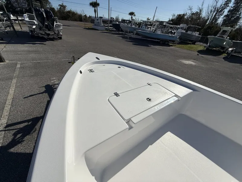 Slide: The Image of 2026 Sea Pro 172 Bay boat displayed in parking lot. - 9