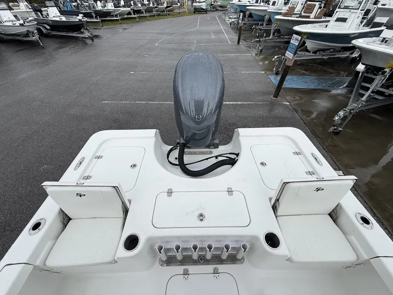Slide: The Image of Rear view of a 2026 Sea Pro 230 Bay boat in a parking lot. - 11