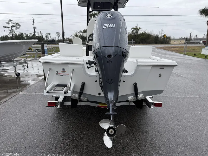 Slide: The Image of Rear view of a 2026 Sea Pro 230 Bay boat with outboard motor. - 3