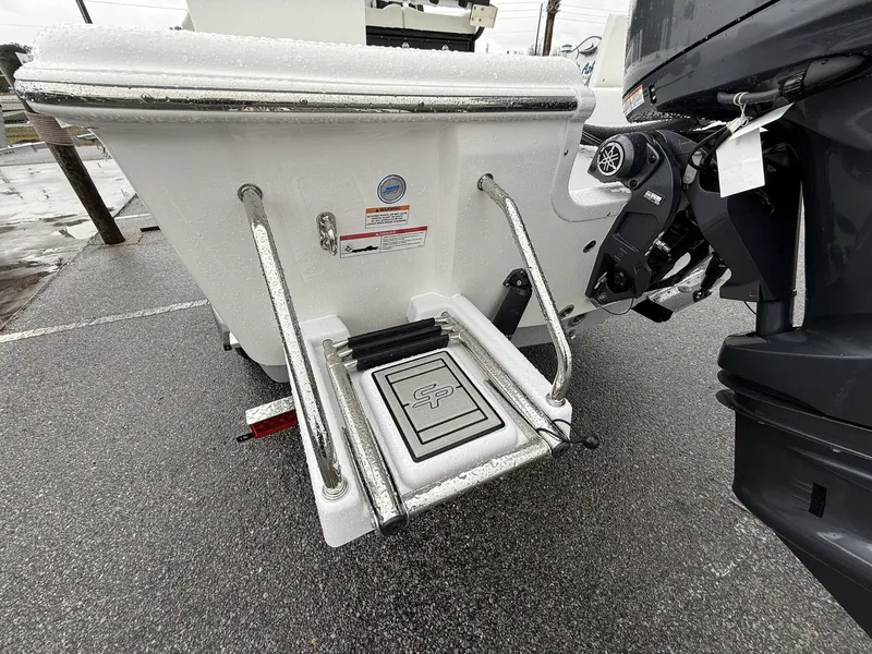 Slide: The Image of Rear view of a 2026 Sea Pro 230 Bay boat with engine. - 8