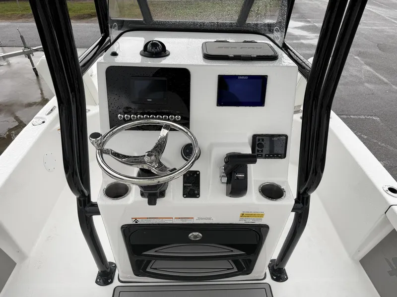 Slide: The Image of Interior view of 2026 Sea Pro 230 Bay boat cockpit. - 9