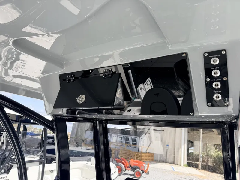 Slide: The Image of Interior view of Sea Pro 242 DLX 2026 with control console. - 8