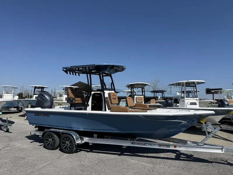 The Image of 2026 Sea Pro 230 Bay boat on trailer outdoors. - 1