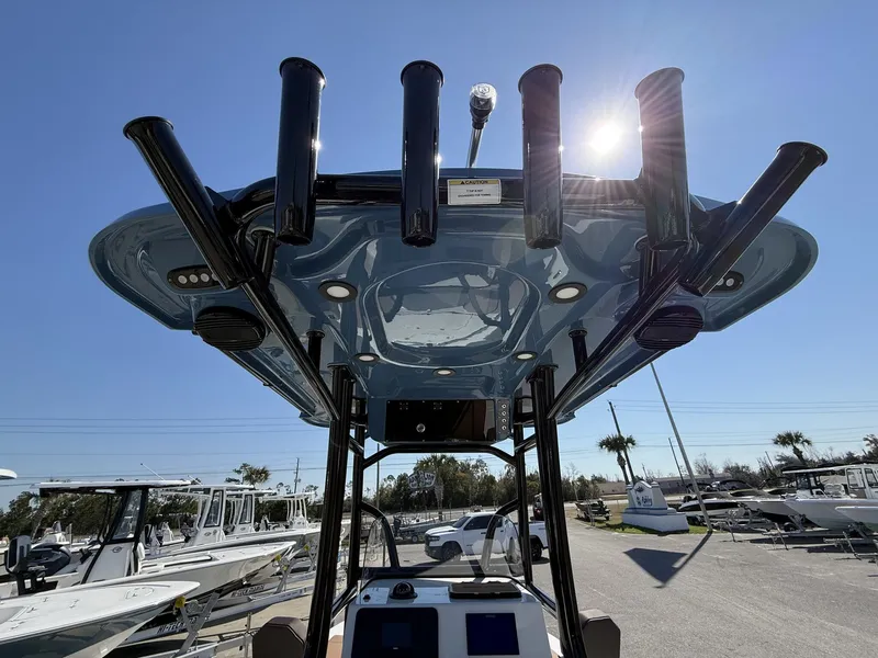Slide: The Image of Sea Pro 230 Bay 2026 with T-top and fishing rod holders. - 12