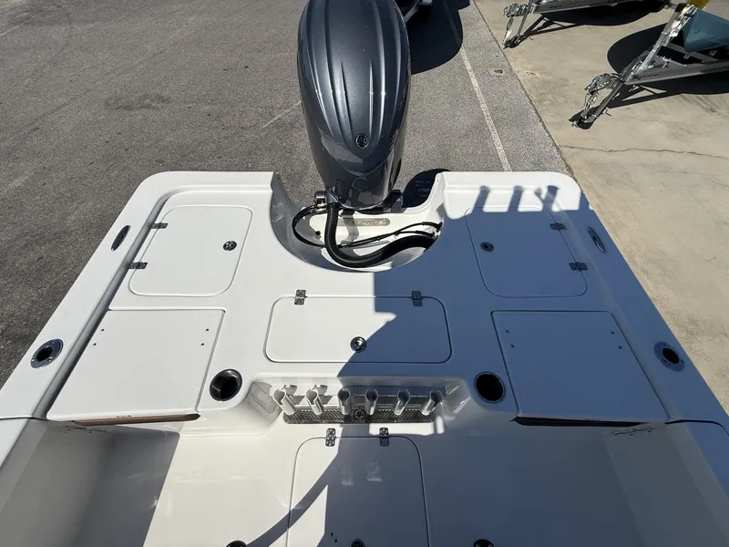 Slide: The Image of Rear view of a 2026 Sea Pro 230 Bay boat. - 13