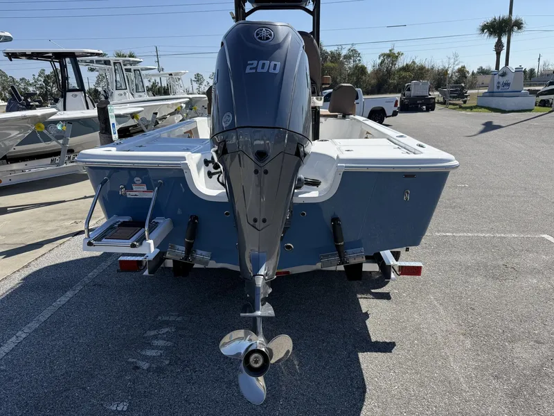 Slide: The Image of Rear view of a 2026 Sea Pro 230 Bay boat with outboard motor. - 3