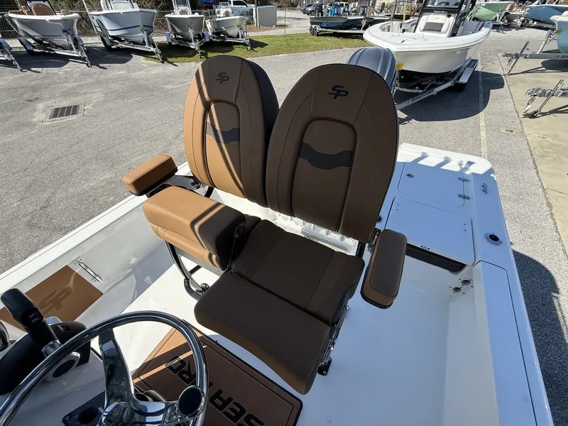 Slide: The Image of Interior of 2026 Sea Pro 230 Bay with brown seats. - 6