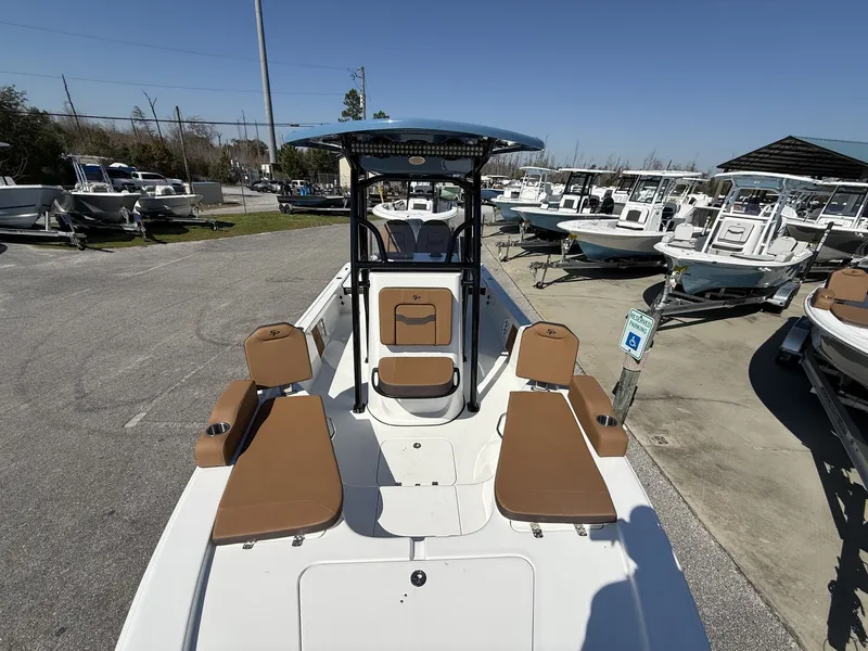 Slide: The Image of 2026 Sea Pro 230 Bay boat on a parking lot. - 9