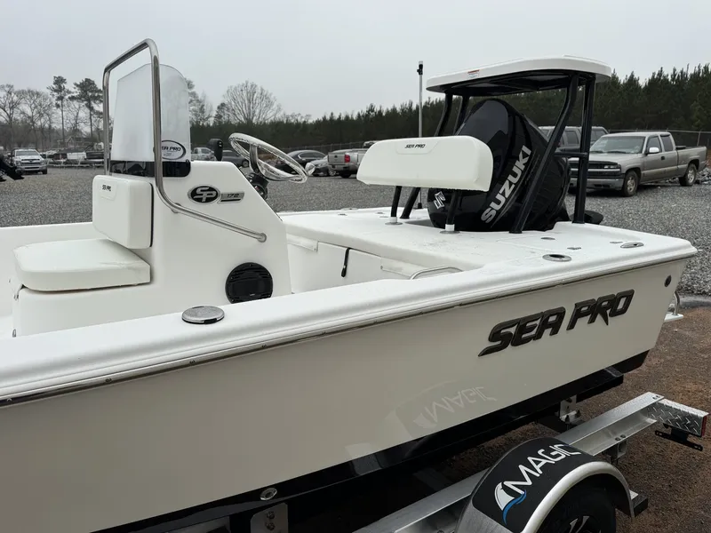 Slide: The Image of 2026 Sea Pro 172 Bay boat with Suzuki engine on trailer. - 4