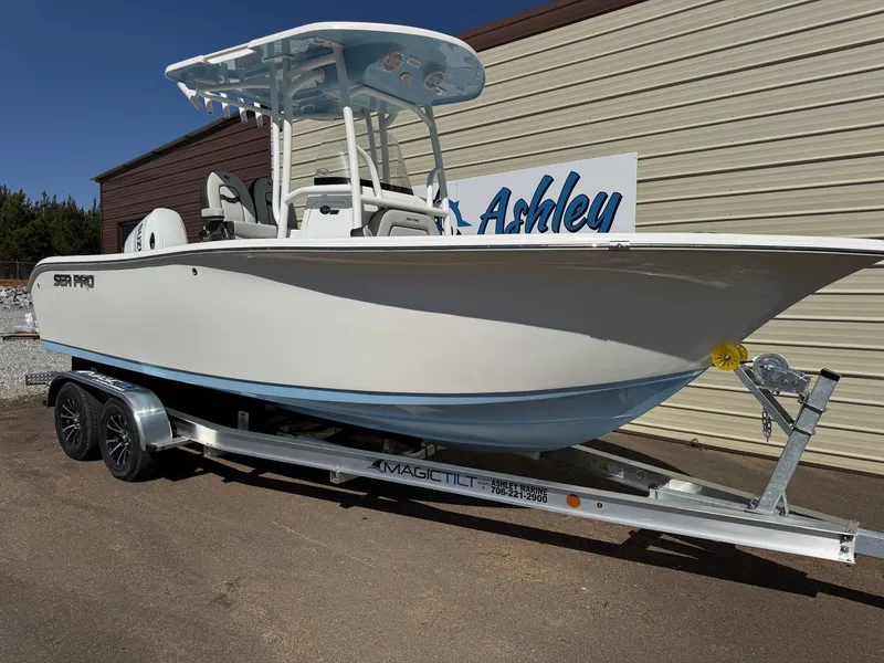 Slide: The Image of 2026 Sea Pro 222 Center Console on trailer outside building. - 6