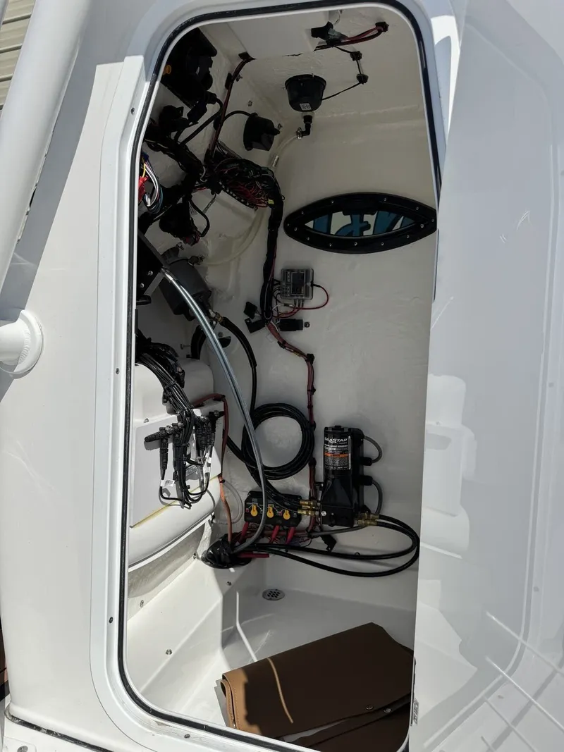 Slide: The Image of Interior view of 2026 Sea Pro 230 Bay with wiring. - 9