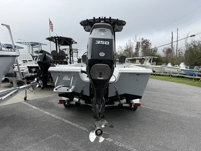 Slide: The Image of 2026 Sea Pro 250 Bay boat with 350HP engine in parking lot. - 3