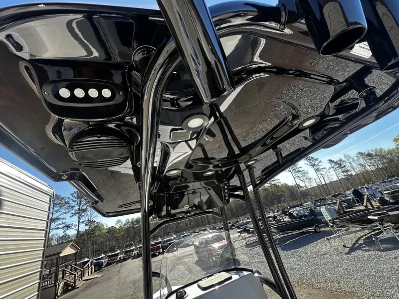 Slide: The Image of 2026 Sea Pro 250 Bay boat roof with lights and speakers. - 4