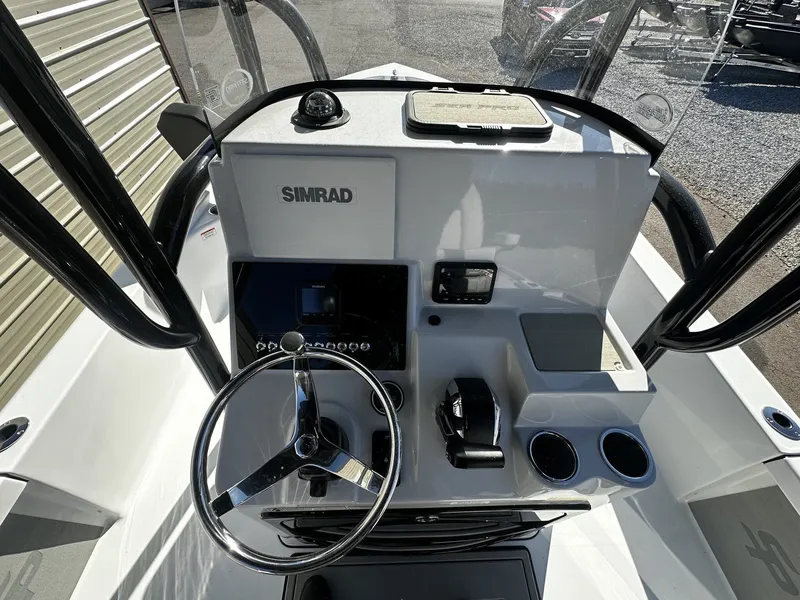 Slide: The Image of Interior view of Sea Pro 250 Bay 2026 helm with Simrad electronics. - 5