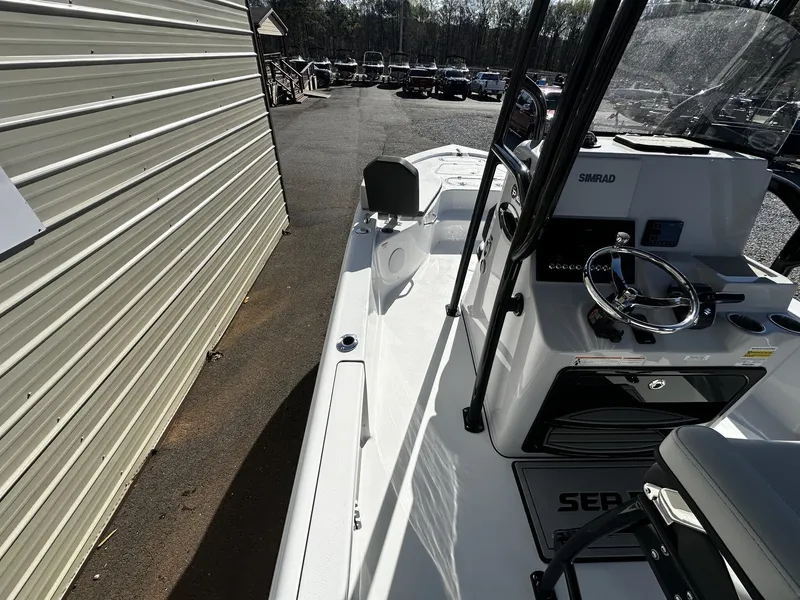 Slide: The Image of 2026 Sea Pro 250 Bay boat cockpit and helm station. - 9