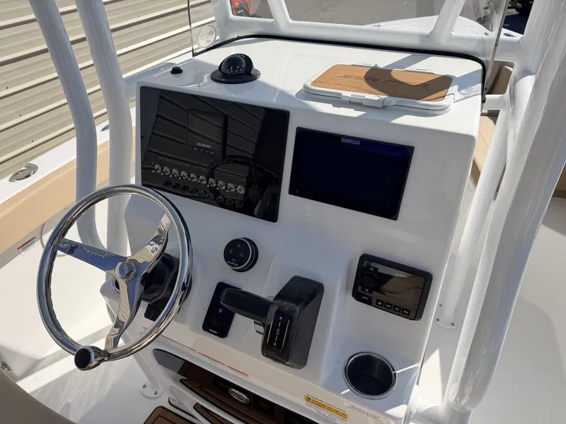 Slide: The Image of Sea Pro 225FLX Sandbar 2026 helm with modern controls and displays. - 6