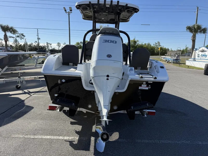 Slide: The Image of Rear view of a 2026 Sea Pro 245FLX boat with 300 HP engine. - 3
