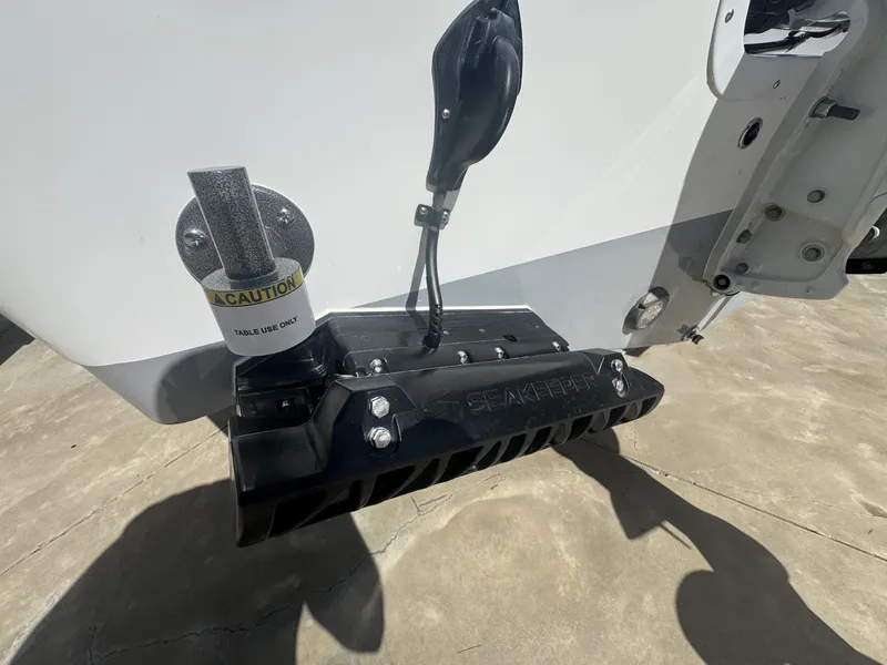 Slide: The Image of Rear view of a 2026 Sea Pro 245FLX R boat. - 13