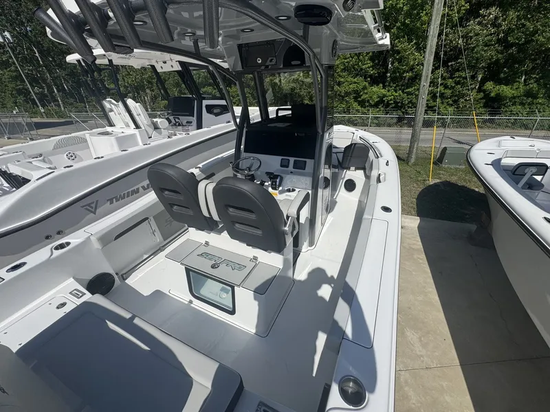 Slide: The Image of 2026 Sea Pro 245FLX R boat with modern features. - 14