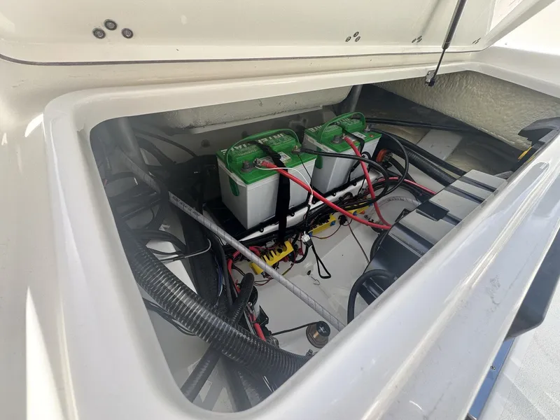 Slide: The Image of Battery compartment of Sea Pro 245FLX R boat, model year 2026. - 16