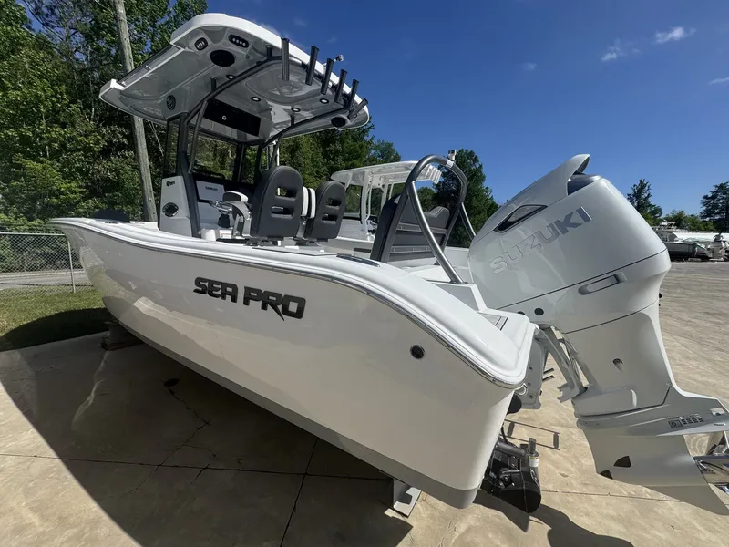 Slide: The Image of 2026 Sea Pro 245FLX R boat with Suzuki outboard motor. - 7