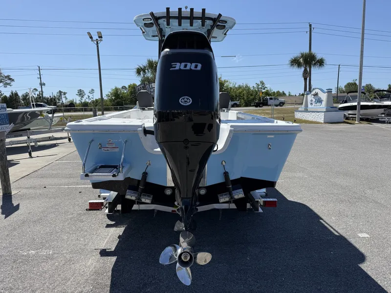Slide: The Image of Rear view of a 2026 Sea Pro 250 Bay boat with 300 HP engine. - 3