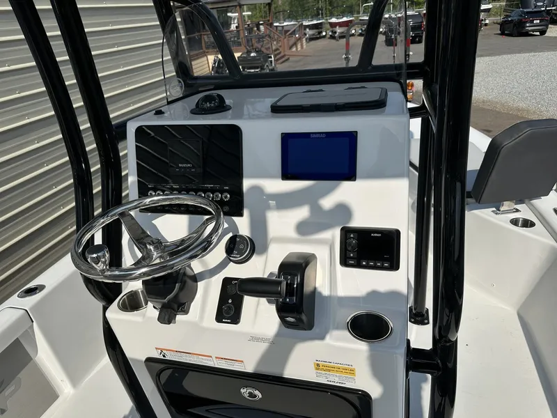 Slide: The Image of Interior view of 2026 Sea Pro 230 Bay helm. - 8
