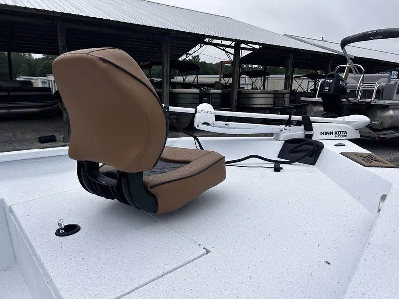 Slide: The Image of 2026 Xpress H20B Bay boat with Minn Kota motor and seat. - 5