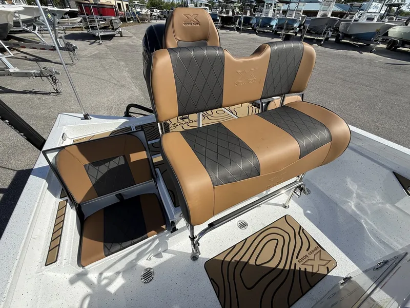 Slide: The Image of 2026 Xpress Hyper-Lift Bay Series H20B boat seats in brown and black. - 11