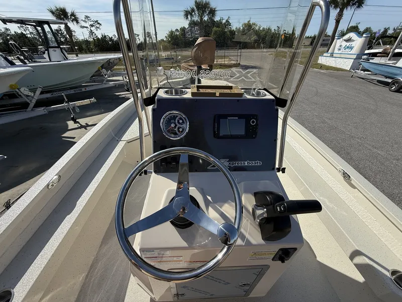 Slide: The Image of Steering console of Xpress Hyper-Lift Bay Series H22B boat, year 2026. - 12