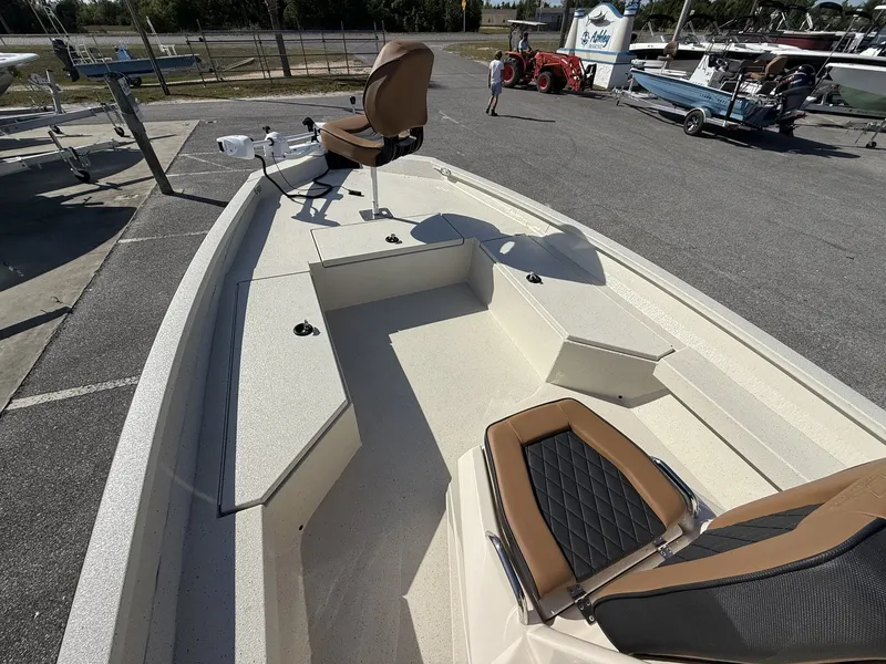 Slide: The Image of 2026 Xpress Hyper-Lift Bay Series H22B boat with seating and storage. - 9