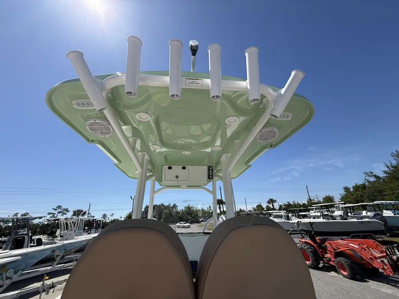 Slide: The Image of Sea Pro 222 Center Console 2026 with rod holders and sunshade. - 11