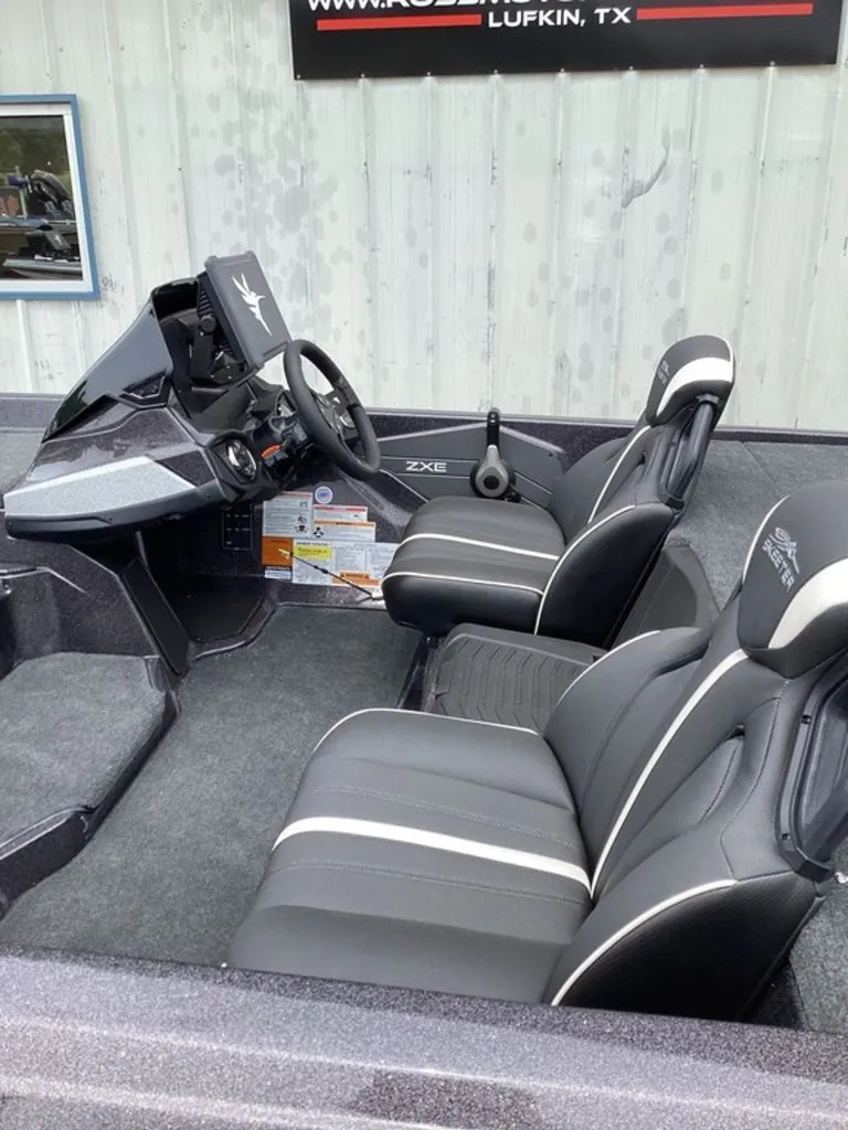 Slide: The Image of Interior of a 2026 Skeeter ZXE21 boat with modern seating. - 11