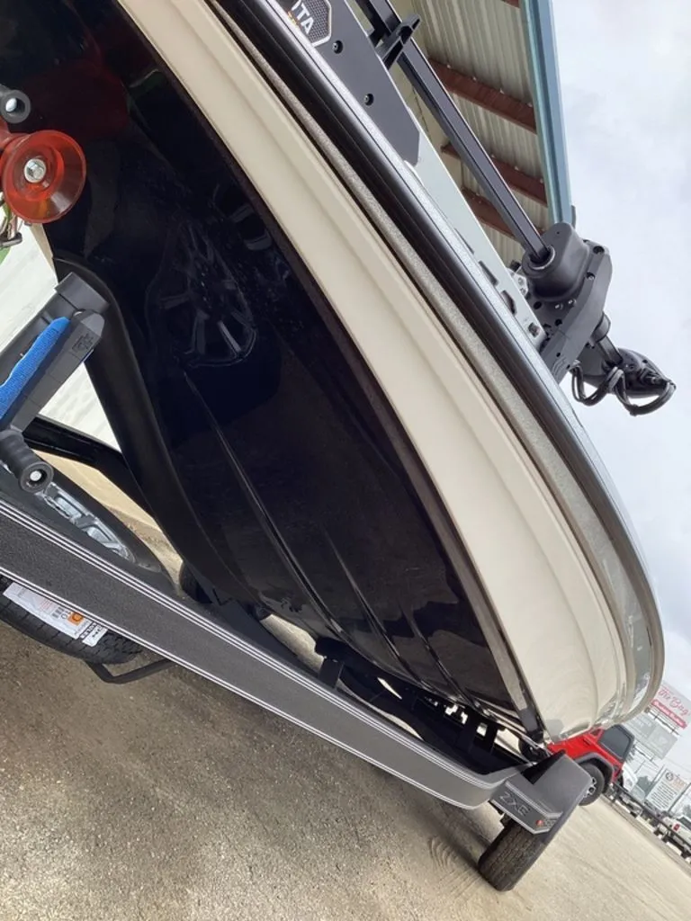 Slide: The Image of Underside of a 2026 Skeeter ZXE21 boat on a trailer. - 15