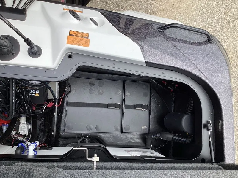 Slide: The Image of Interior view of Skeeter ZXE21 2026 with electronics and wiring. - 27