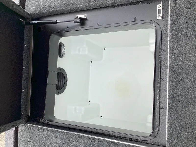 Slide: The Image of Interior view of Skeeter ZXE21 2026 storage compartment. - 31
