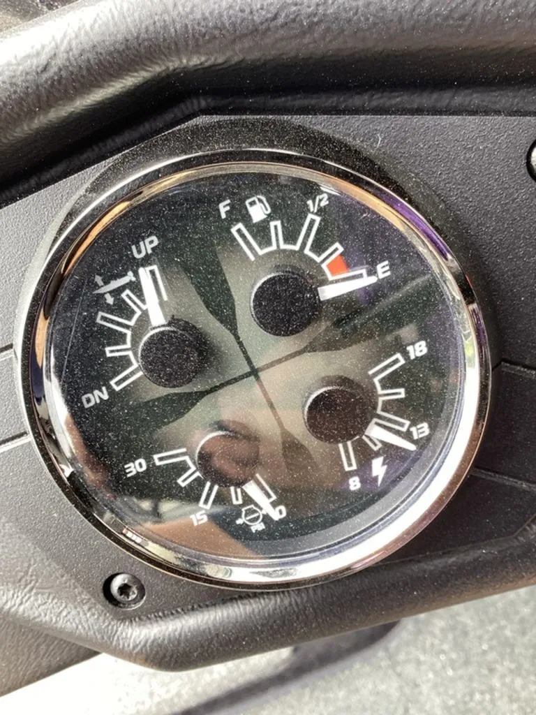 Slide: The Image of Dashboard of a 2026 Skeeter ZXE21 with various gauges. - 42